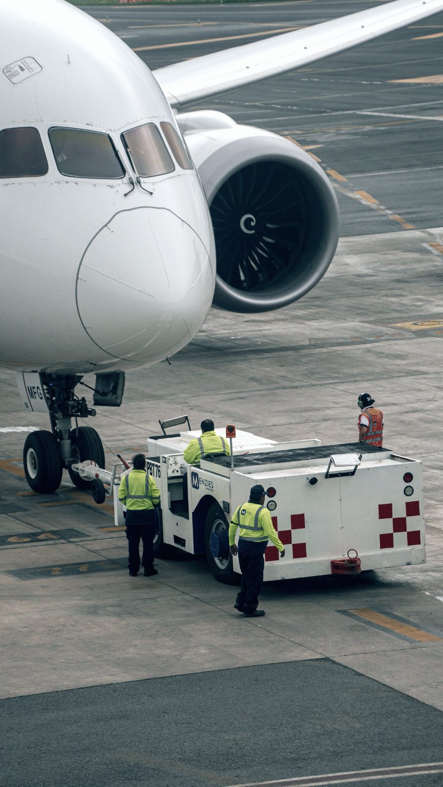 Pushback crew turning an aircraft on the ramp